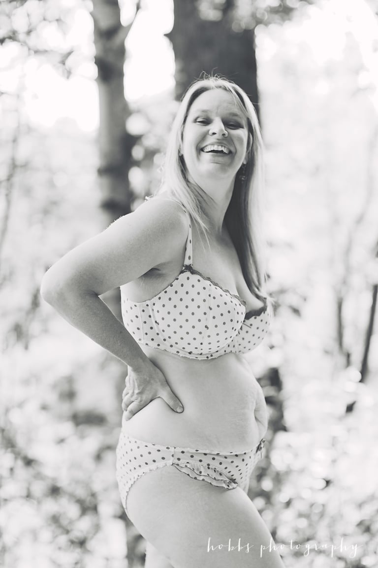 edmonton mother of three poses for postpartum beauty series
