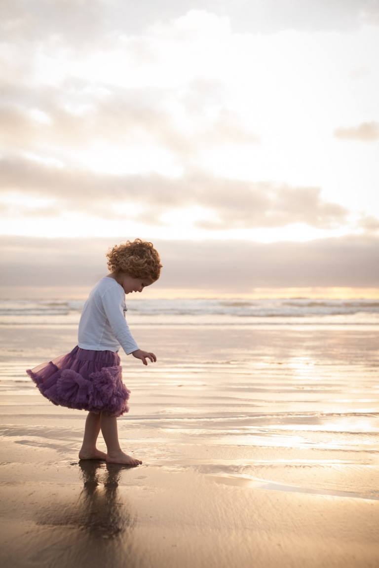 unscripted portrait of little girl on Vancouver Island beach