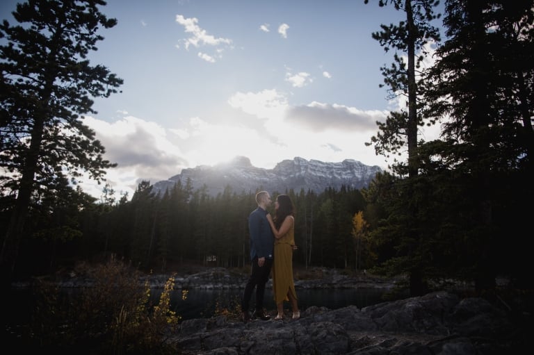 rocky mountains in Banff National park provide a beautiful background for engagement pictures by Edmonton wedding photographer
