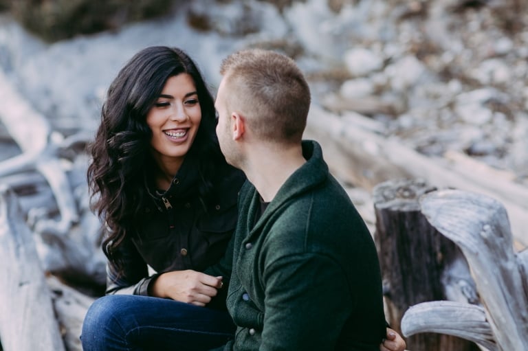 beautiful bride to be smiles at her fiance