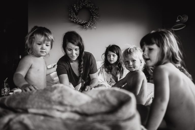 four older siblings are excited to meet the new baby after a speedy homebirth