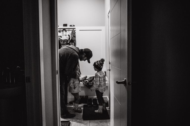 family gets ready to go outside