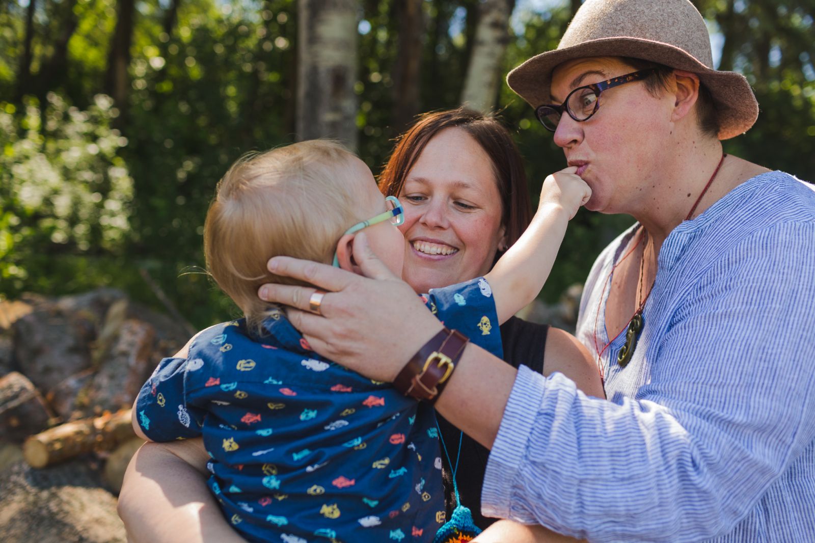 a toddler with his two moms photographed by lgbtp+ friendly Edmonton photographer
