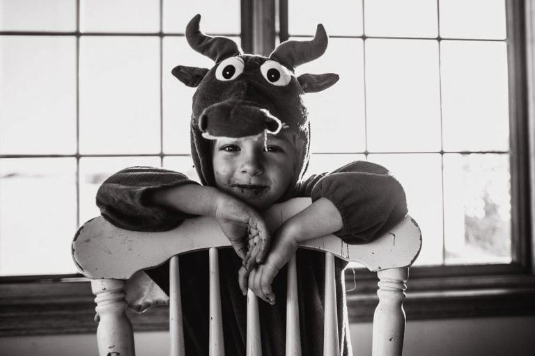little boys stands for black and white environmental portrait