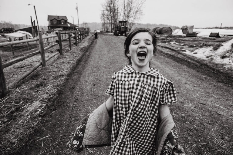 a wild child runs outside celebrating spring