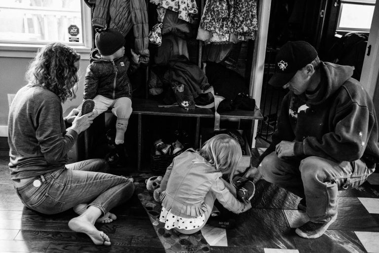 family gets ready to go outside