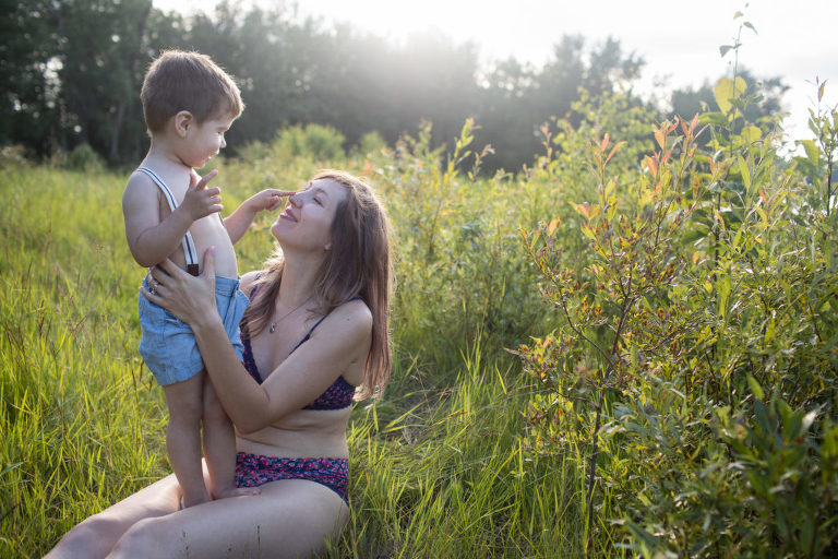 adoptive mother connects with her son in motherhood session
