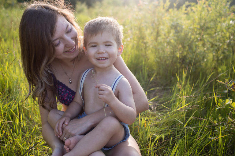adoptive mother and son at golden hour photo session near Edmonton